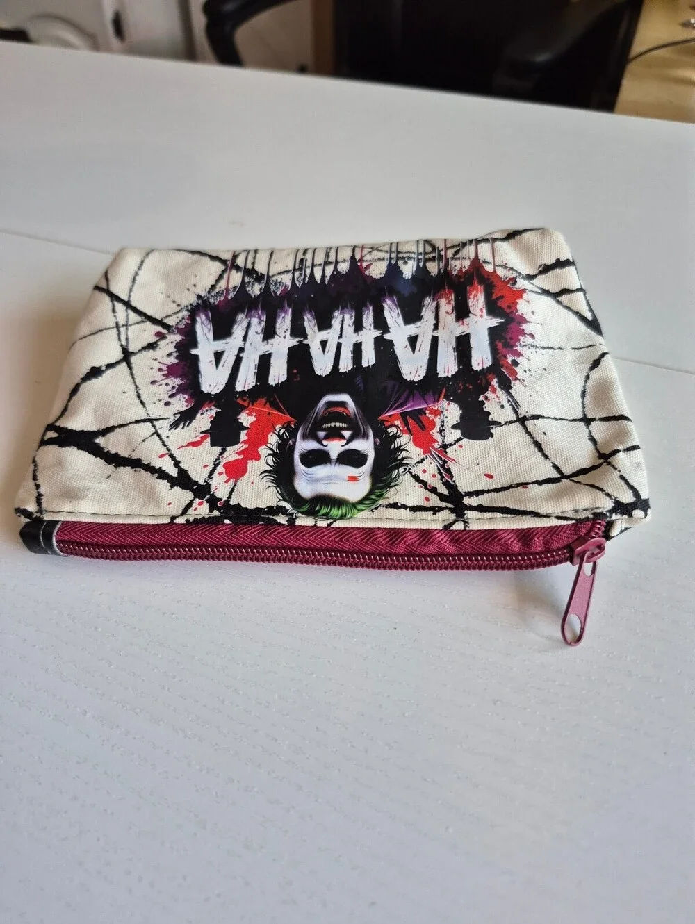 super villian laughing paint splatter Versatile Cosmetic Pouch creme, black